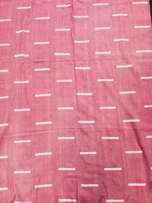 White Dashes on Pink Mali Mudcloth Fabric.
