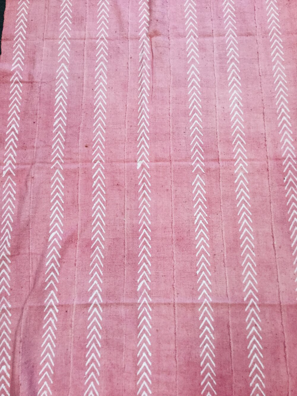 White Chevrons on Pink African Mudcloth.