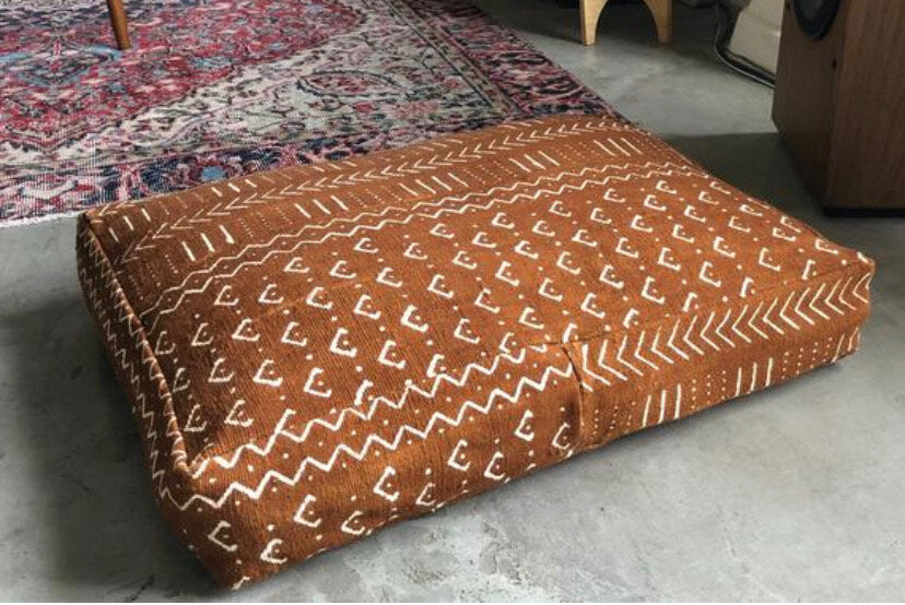 XL Dog Bed Cover on Rust Mudcloth Fabric.