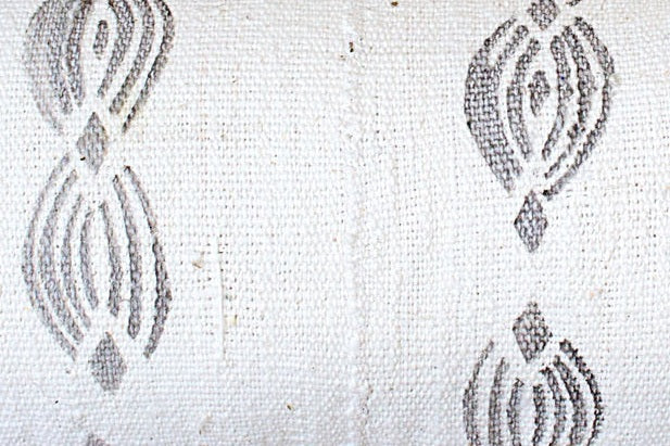 Loop Pattern on White Lumbar Mudcloth Pillow.