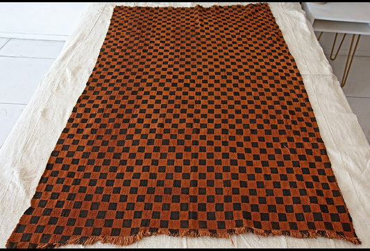 Black checkers on Red mudcloth